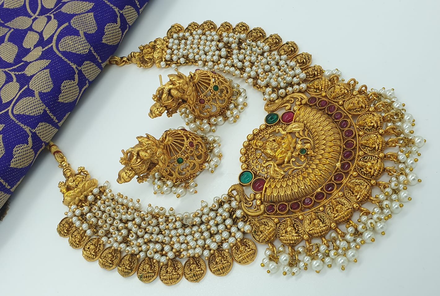 White Pearl With Lakshmi And Peacock Designer Matte Finished Necklace White Pearl With Lakshmi And Peacock Designer Matte Finished Necklace