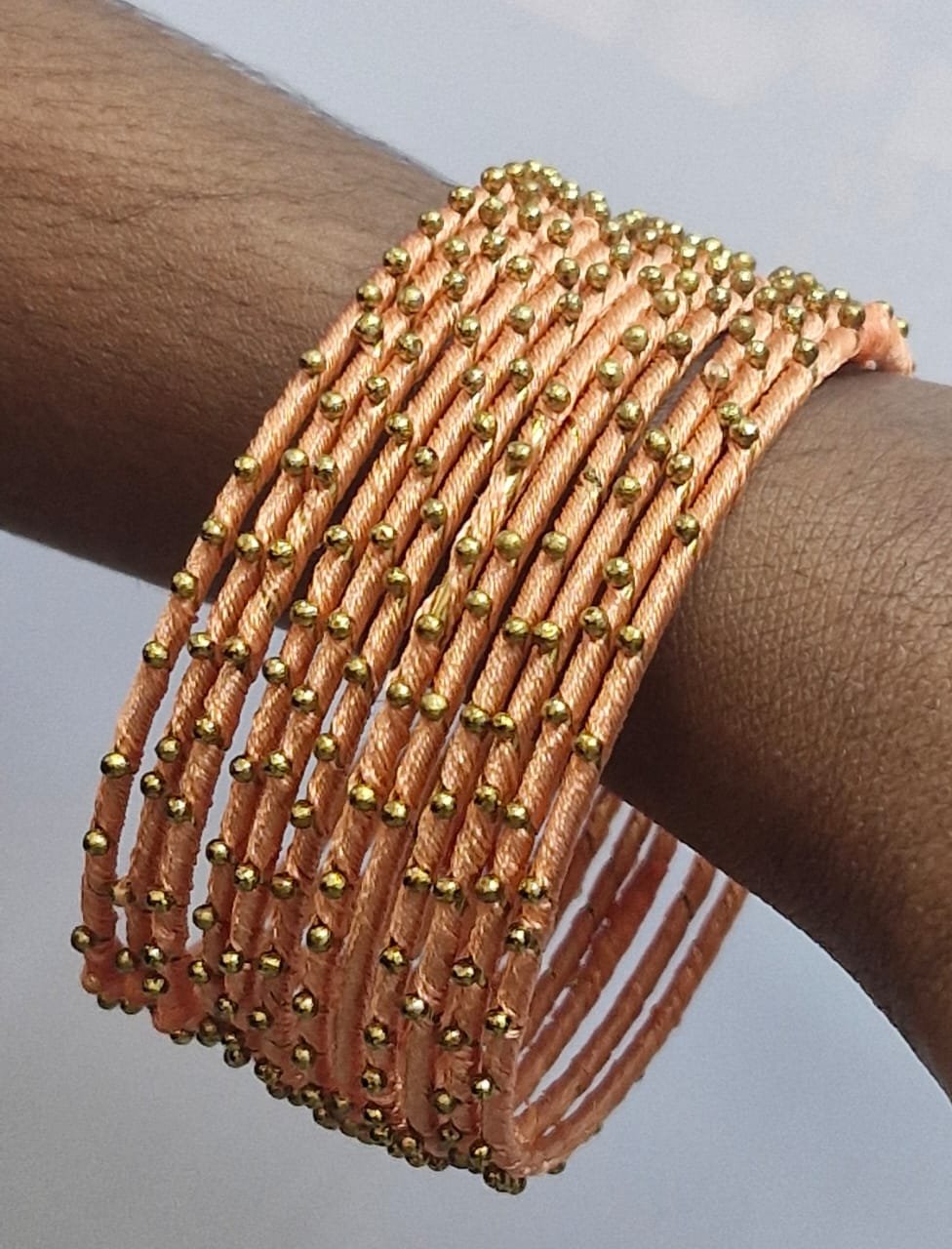 Light Orange Colour Rain Drop Silk Thread Bangles Light Orange Colour Rain Drop Silk Thread Bangles