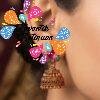 Pink And Green Stone With Floral Designer Oxidised Gold Jhumkha Pink And Green Stone With Floral Designer Oxidised Gold Jhumkha