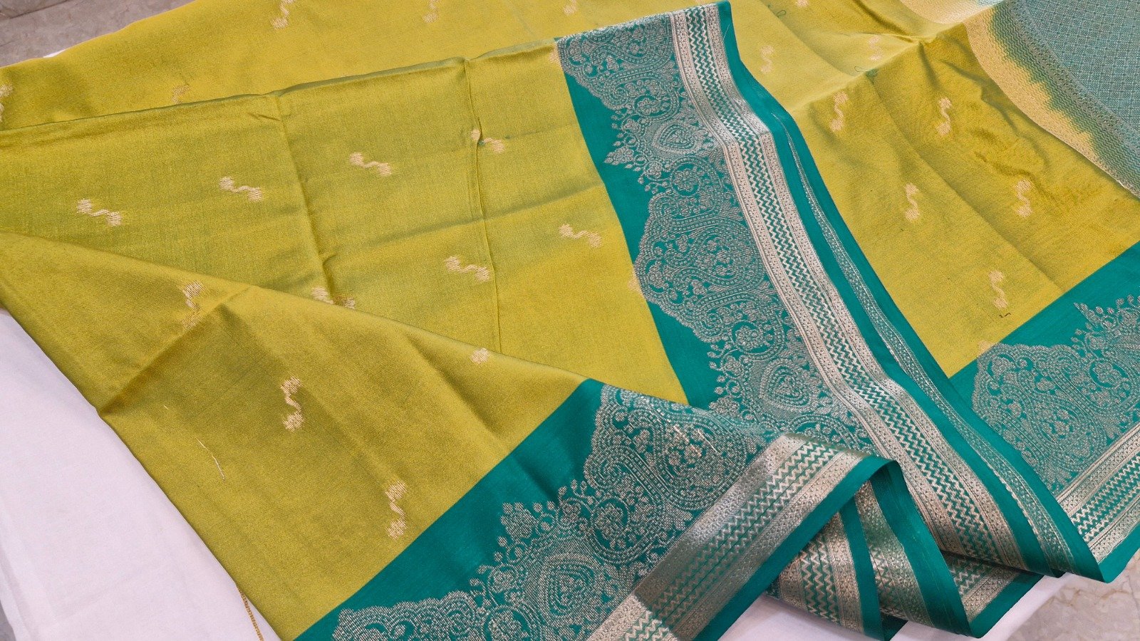 Floral Designer Parrot Green with Teal Green Premium Semi Silk Saree Floral Designer Parrot Green with Teal Green Premium Semi Silk Saree - Image 4